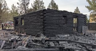 Dog awakens Crooked River Ranch resident who escapes fire that destroyed log home