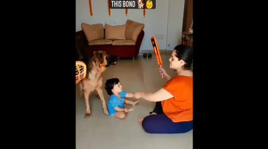 Woman pretends to punish kid, dog reacts to protect the little one