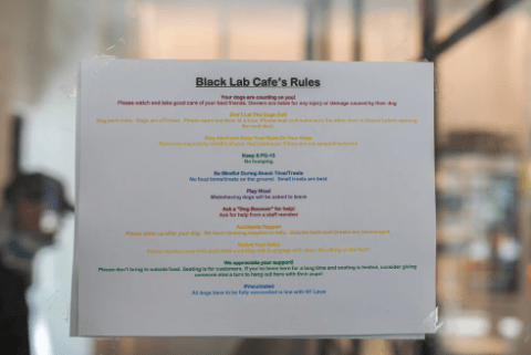 The cafe’s rules are posted.