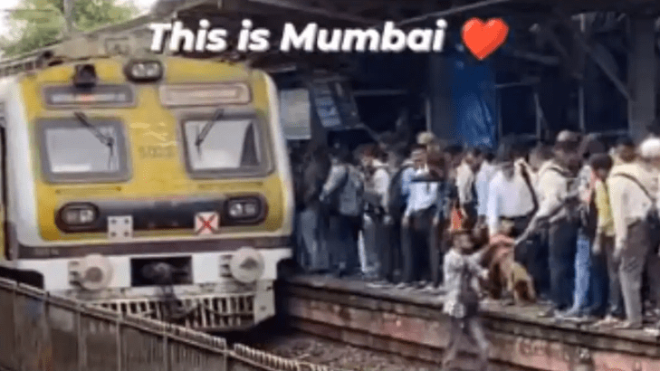 Watch How Man Saves Dog on Railway Track as Train Approaches